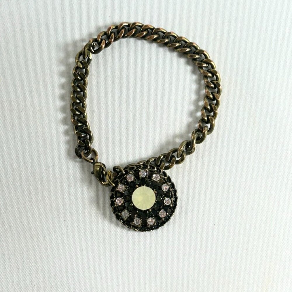 CIRCULAR BOBBLE BRACELET SIZE 6 WITH 11 RHINESTONES & CENTER STONE.